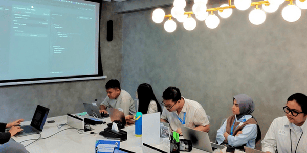 Argi Tendo training participants at the Ajaib AI automation workshop with Infused and Latih AI